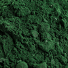 Close-up of green powder on a white background